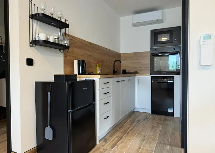 J One Apartmany